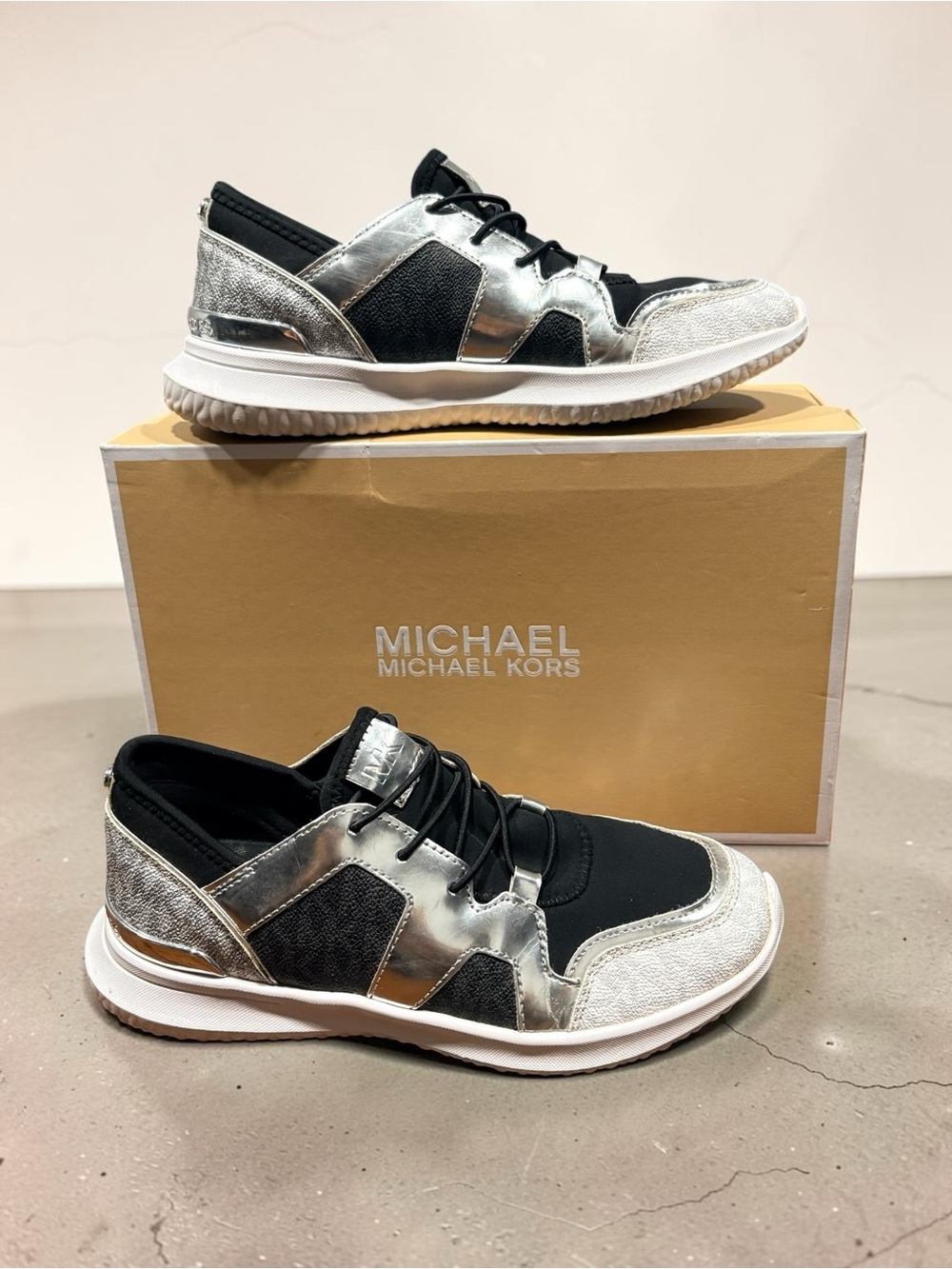 Michael Kors Liv Trainer Extreme Sneakers Black Silver Monogram Wedge Size 7.5